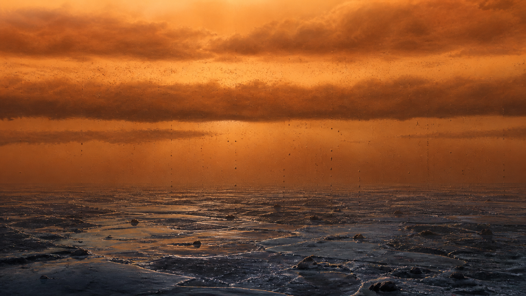Conceptual illustration of organic particles settling through Titan's hazy atmosphere onto an icy surface.